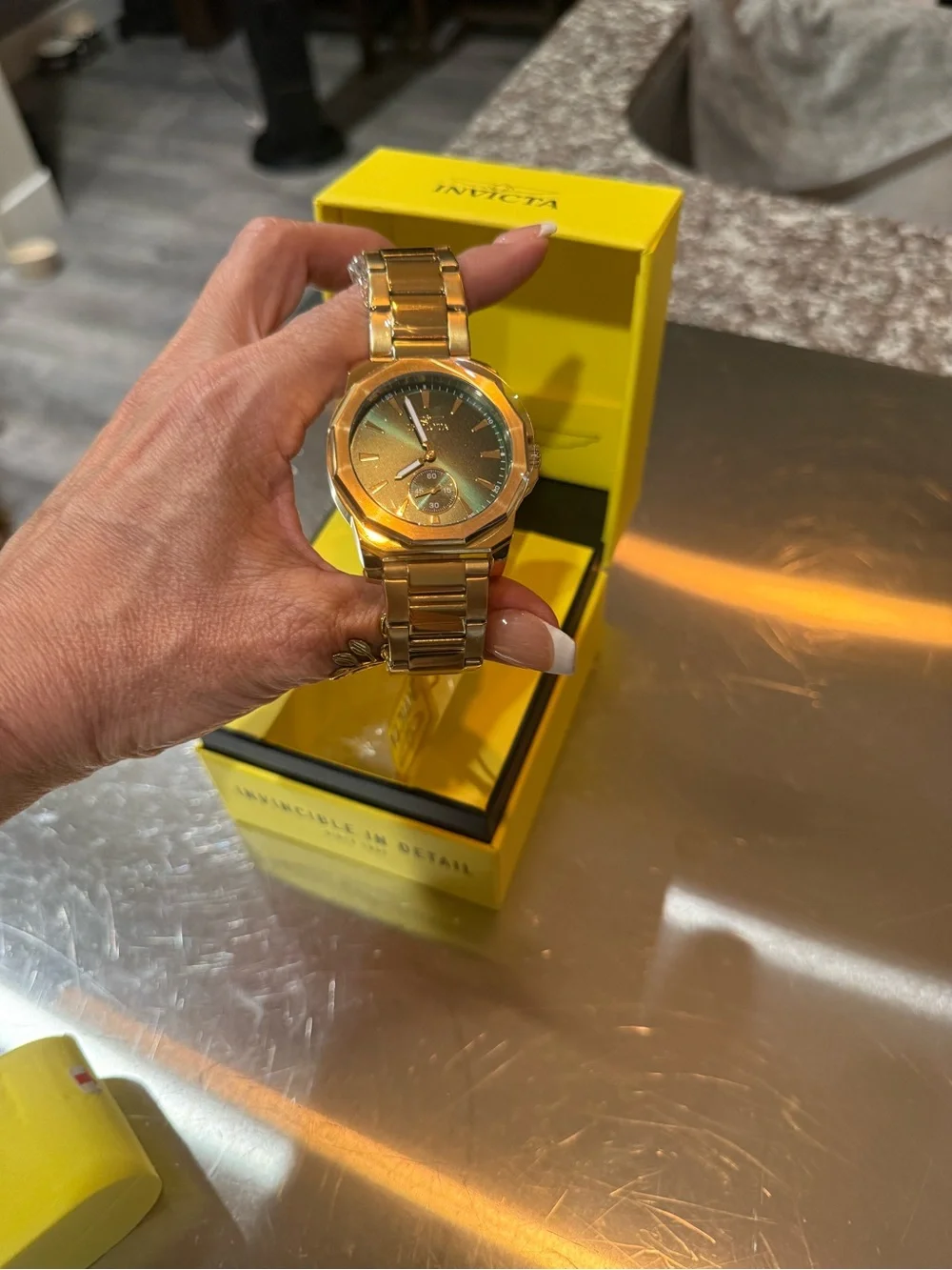 Invicta Gold Tone Watch with Blue-Green Dial